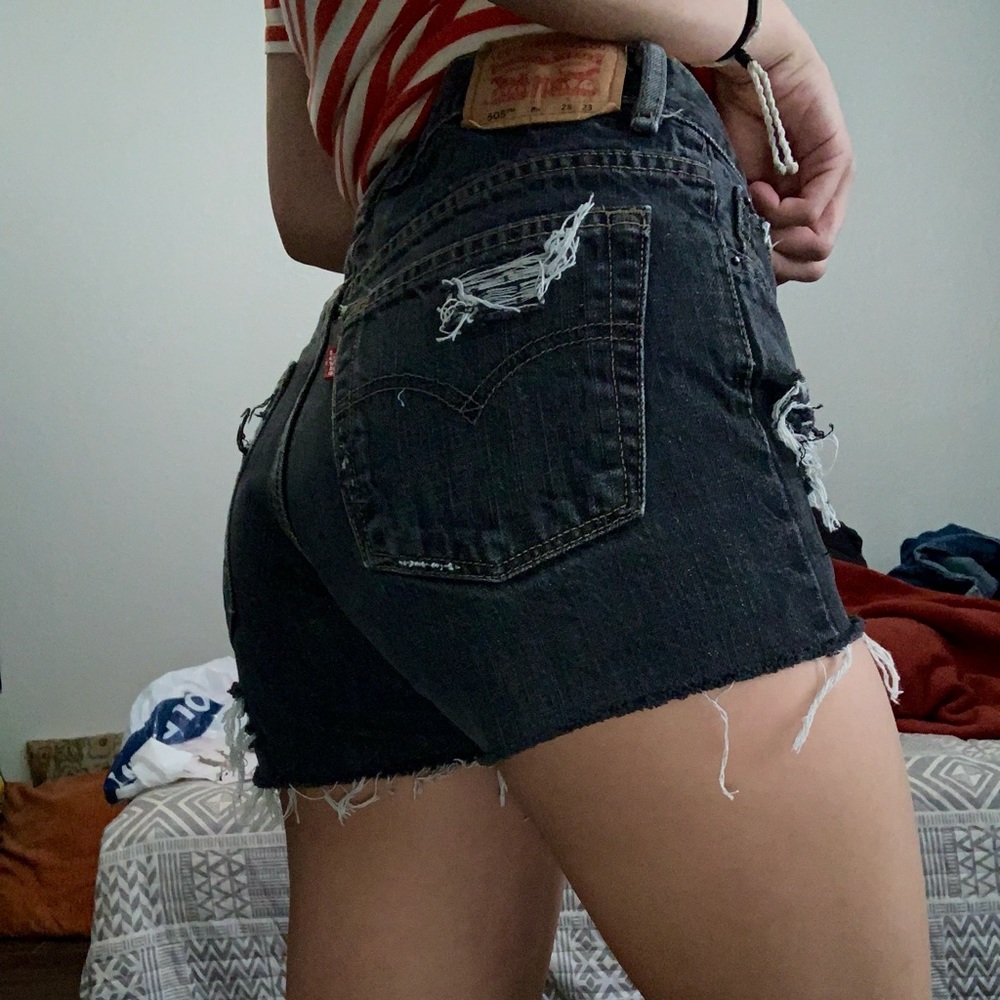 Distressed black levis shorts